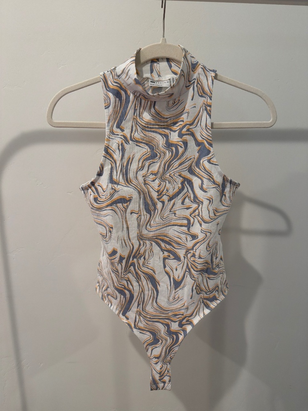 Marble print high neck bodysuit